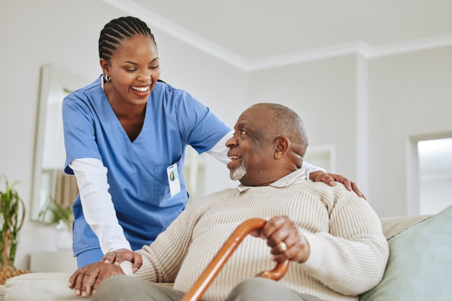 Caregiver providing calm dementia care for a senior at home in Maitland, Central Florida