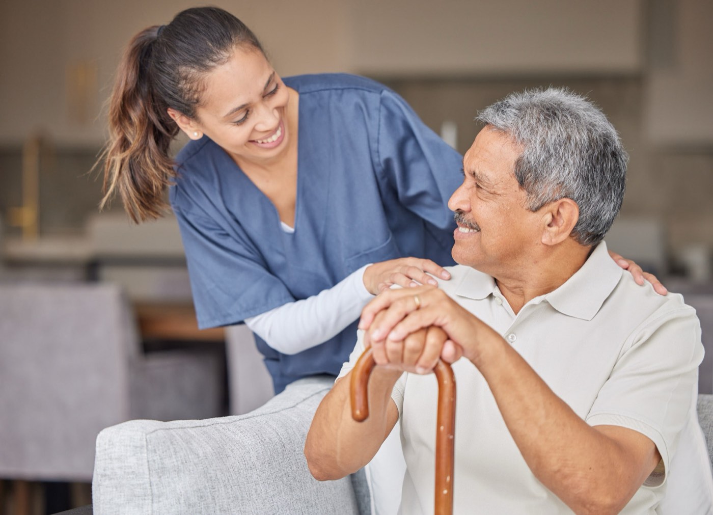 Caregiver helping a senior into a car for an appointment in Maitland, Central Florida